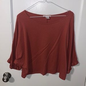 A nice light shirt that has three quarter sleeves. Very comfy and relaxed fit.